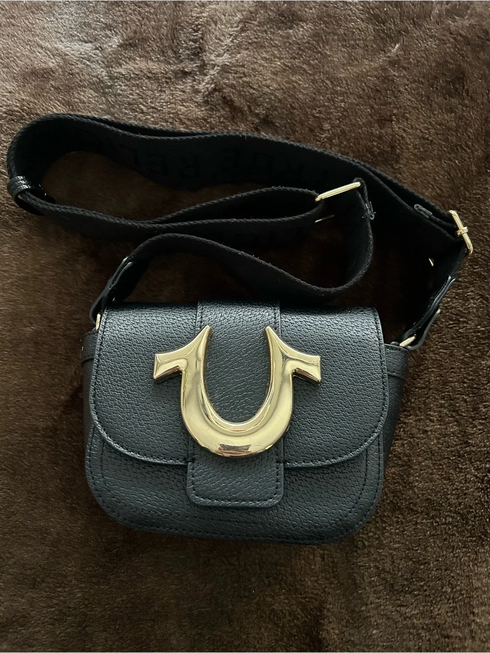 True Religion Black Crossbody Bag with Gold Horseshoe Accent